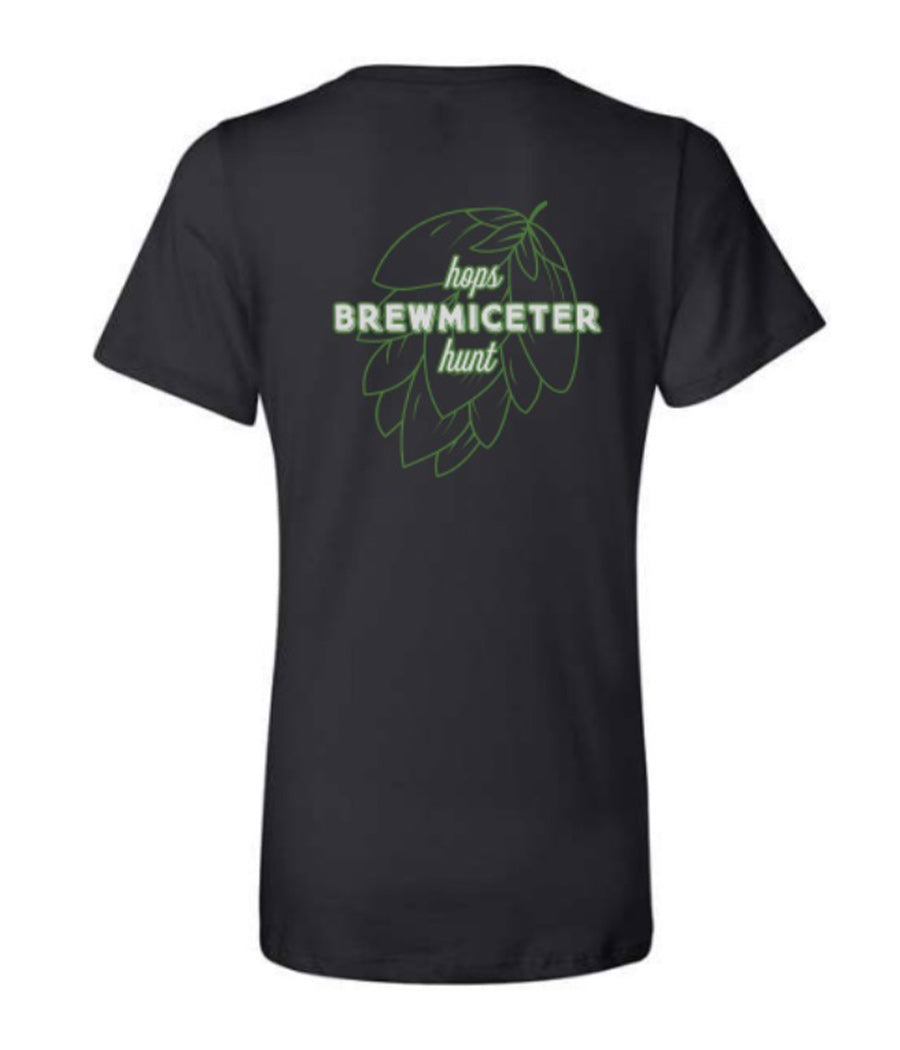 Back of black V-neck ladies tee with green and white Brewmiceter Hops Hunt logo