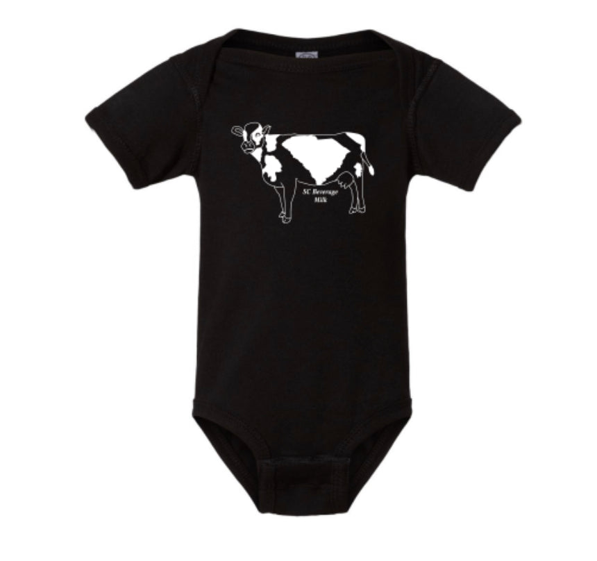 This adorable black onesie with the SC State symbol for our beverage (Milk), with graphic design of white dairy cow with a main spot the shape of South Carolina