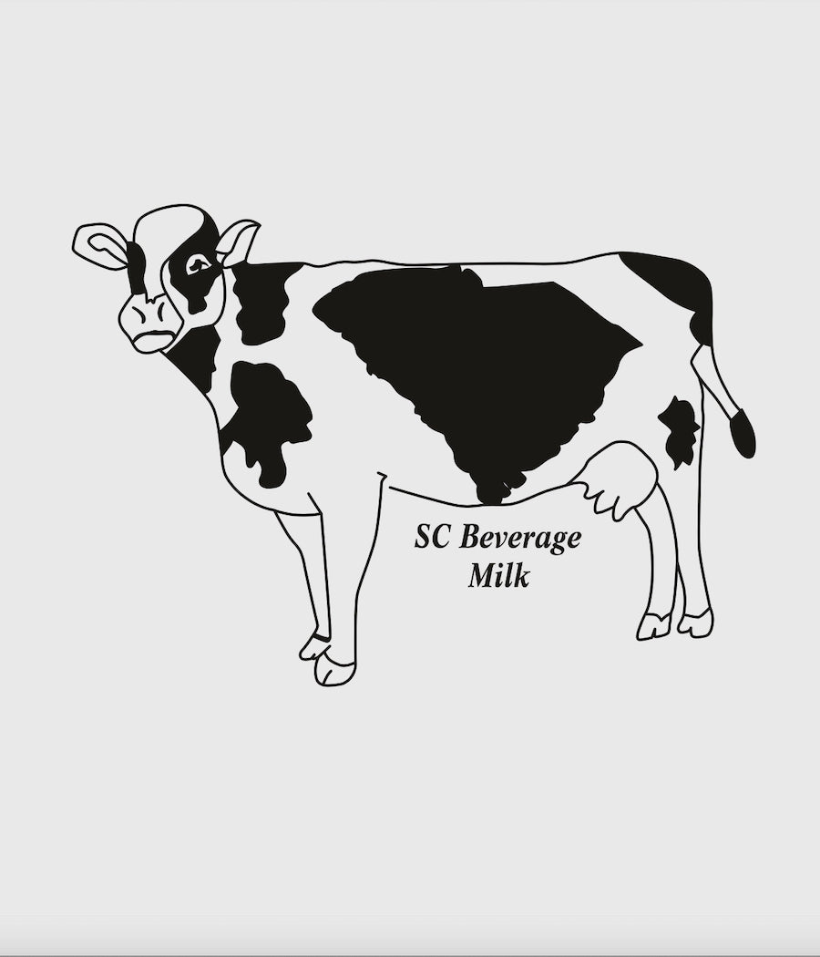 Close Up of White Toddler tee shirt black graphic design of a milking cow with the state of South Carolina as the center spot and the words 