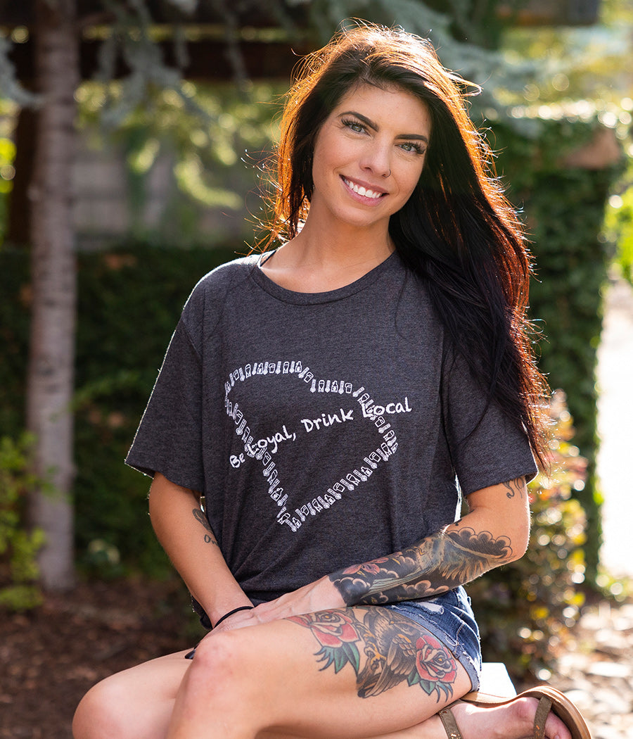 Be Loyal, Drink Local women's dark heather graphic t-shirt.  This updated premium t-shirt has the outline of the state of SC made out of white brewery icons - Tap pulls, beer glasses, fermentation tanks, and growlers.  
